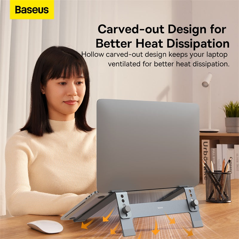 Person using a laptop on a stand with Baseus branding and text about heat dissipation.