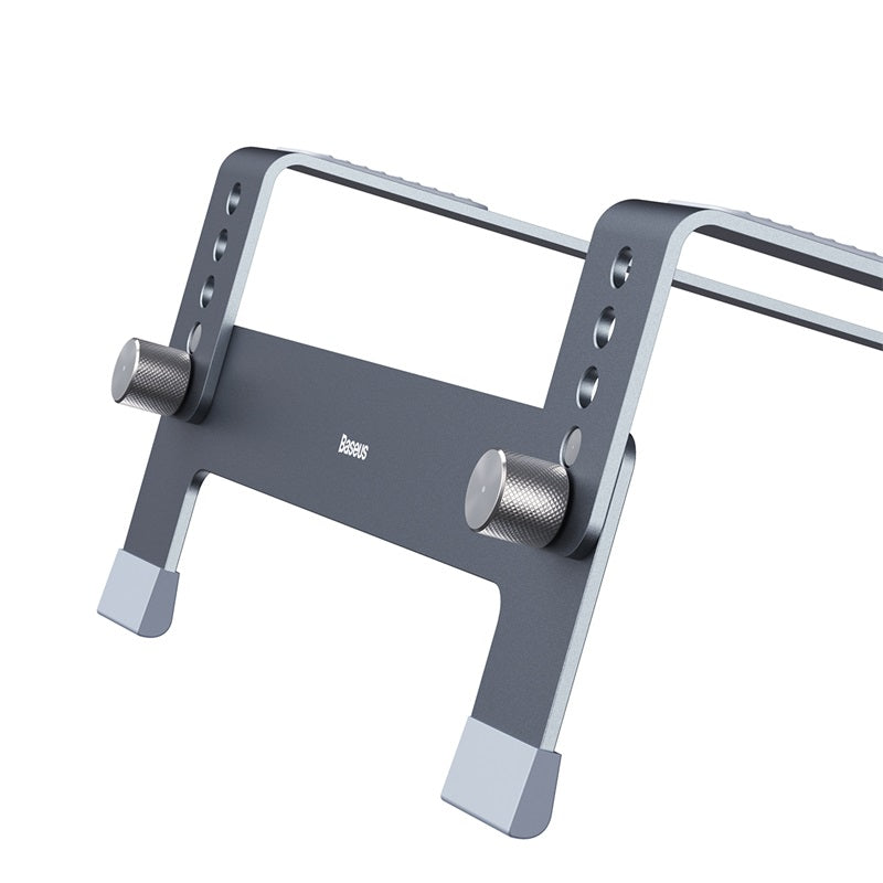 Gray metal bracket with knobs on a white background