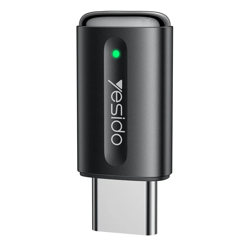Black USB Type-C adapter with green indicator light on a white background