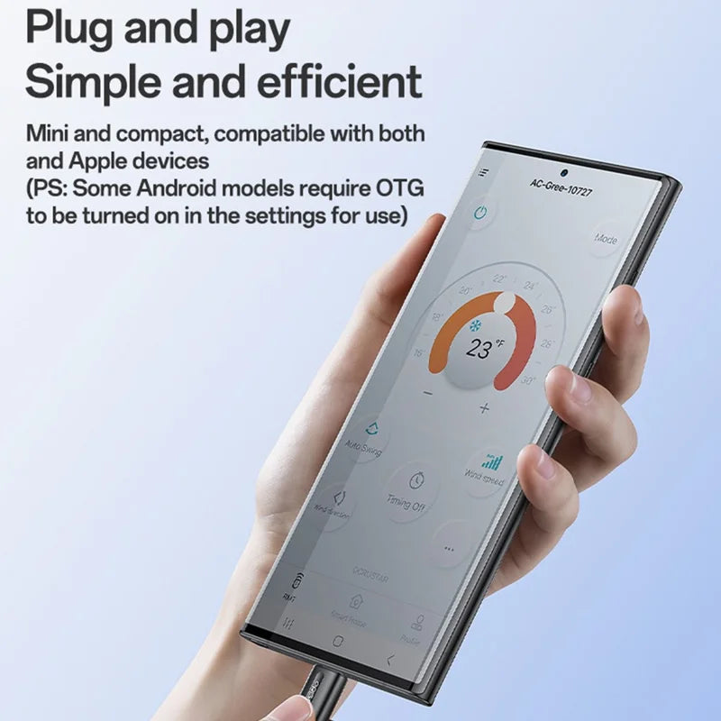 Hand holding a smartphone with a temperature app on a light blue background