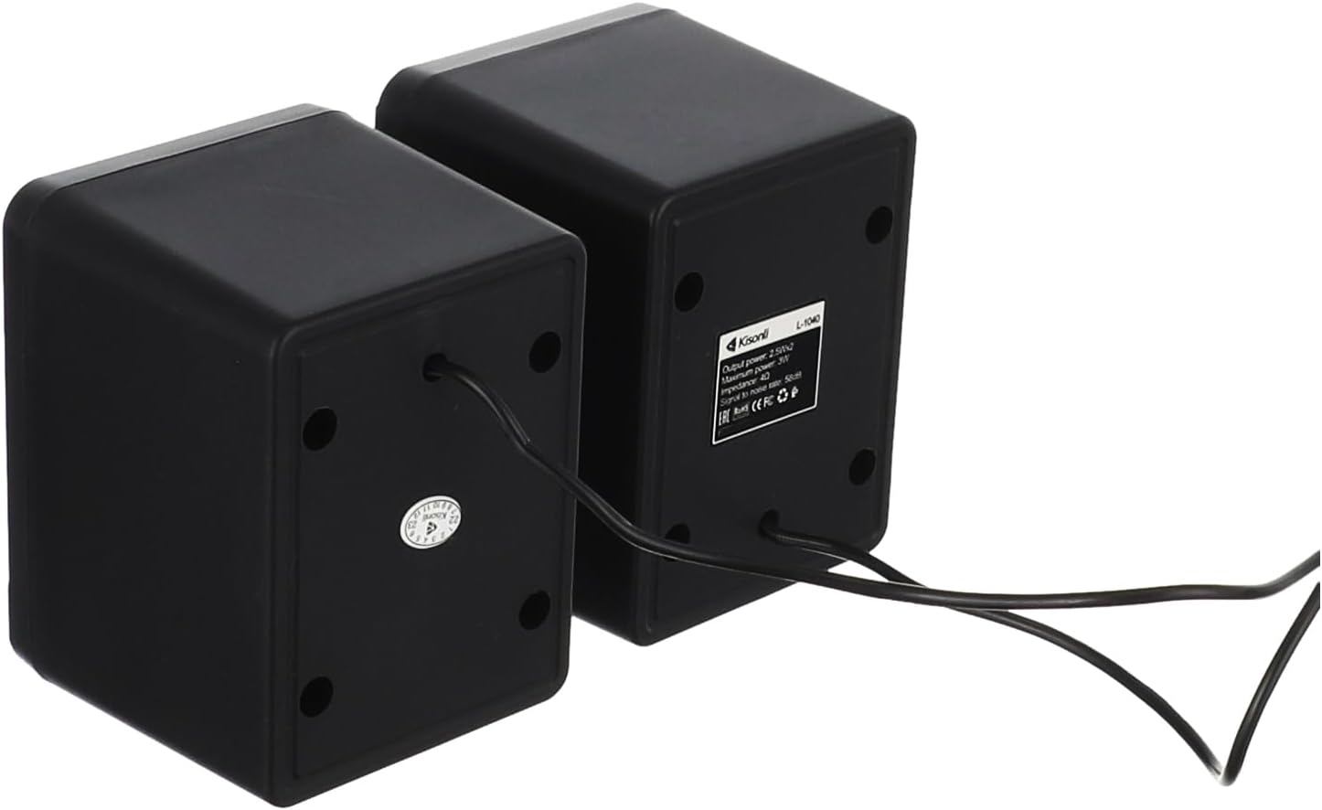 Two black square speakers with cables on a white background