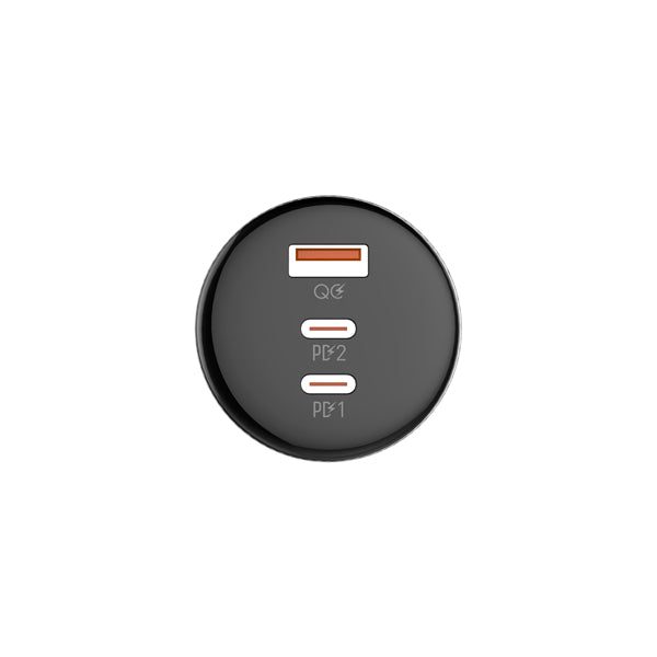 Black circular device with charging ports on a white background