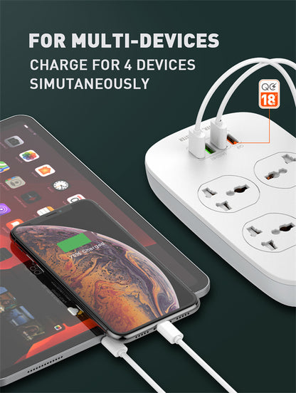 Power strip with multiple outlets and charging cables for smartphones, with text indicating it charges four devices simultaneously.