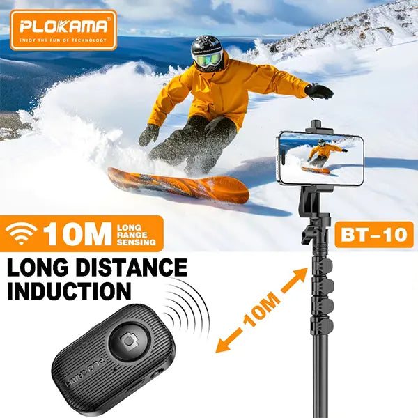 Person snowboarding with a smartphone and Bluetooth device on a snowy landscape, featuring PLOKAMA branding.