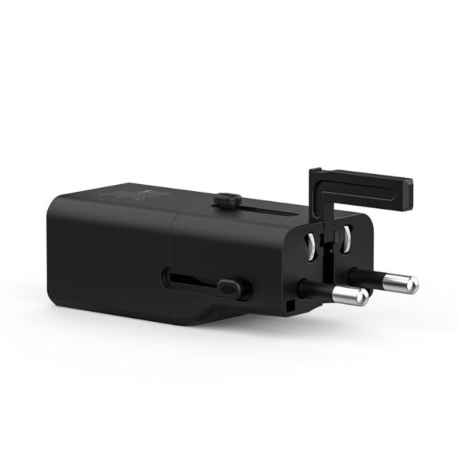 Black travel adapter on a white background