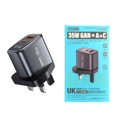 Remax charger with digital display and packaging on a white background