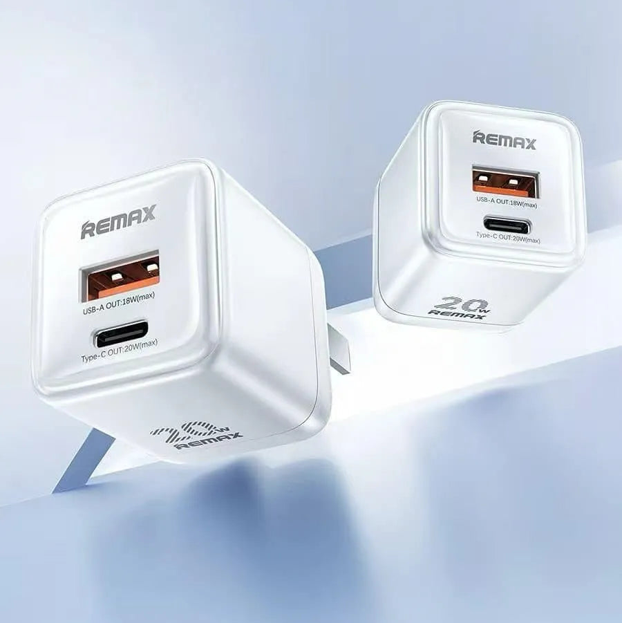 Remax travel charger with two ports on a light blue background