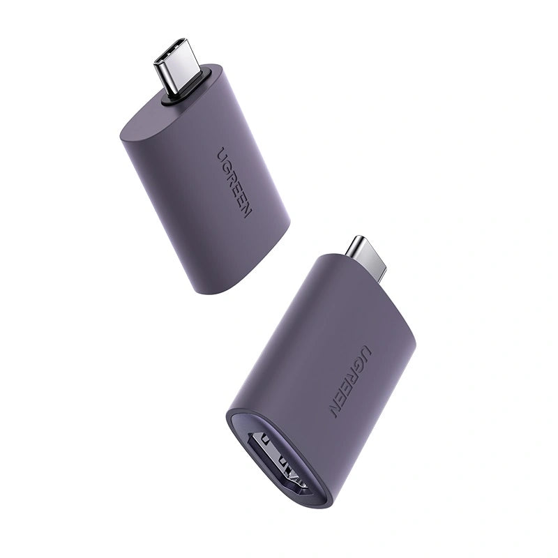 Two purple USB-C adapters on a white background