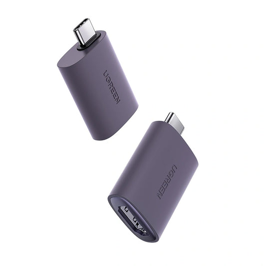 Two purple USB-C adapters on a white background