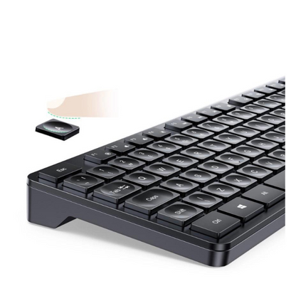 Black keyboard with a wireless mouse on a white background