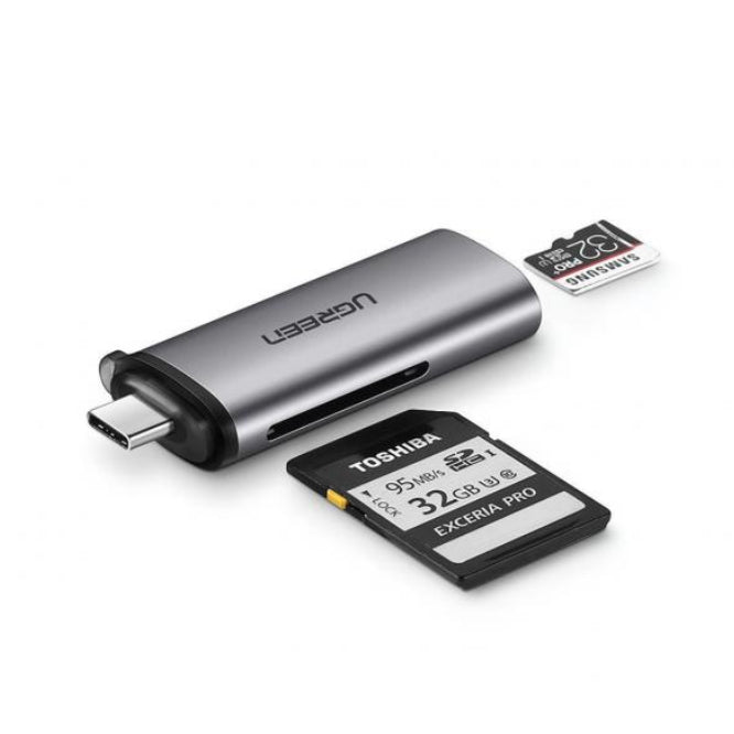 USB Type-C card reader with Toshiba memory card on a white background