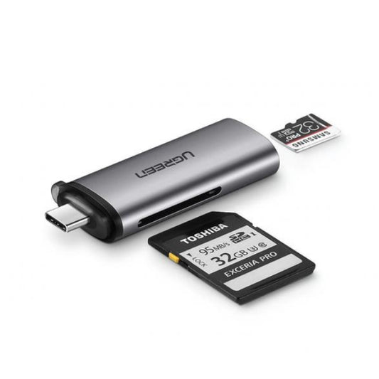 USB Type-C card reader with Toshiba memory card on a white background