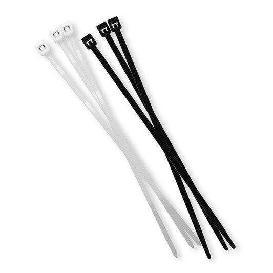 Set of white and black cable ties on a white background